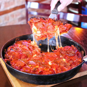 Deep dish pizza at Pequod's in Chicago