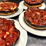 pequods pizza deep dish caramelized crust chicago pizza