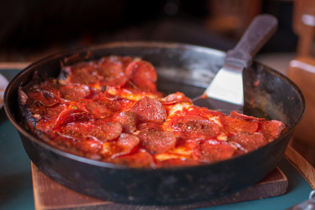 Image of Pequod's pepperoni deep dish pizza