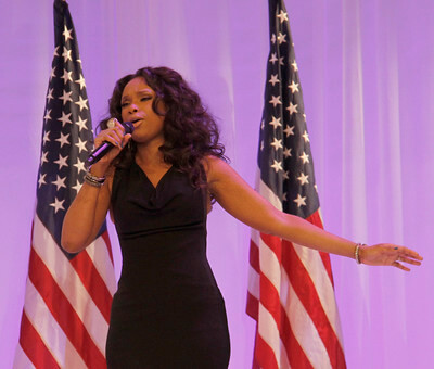 Jennifer Hudson, originally from Chicago, IL, sings at an event