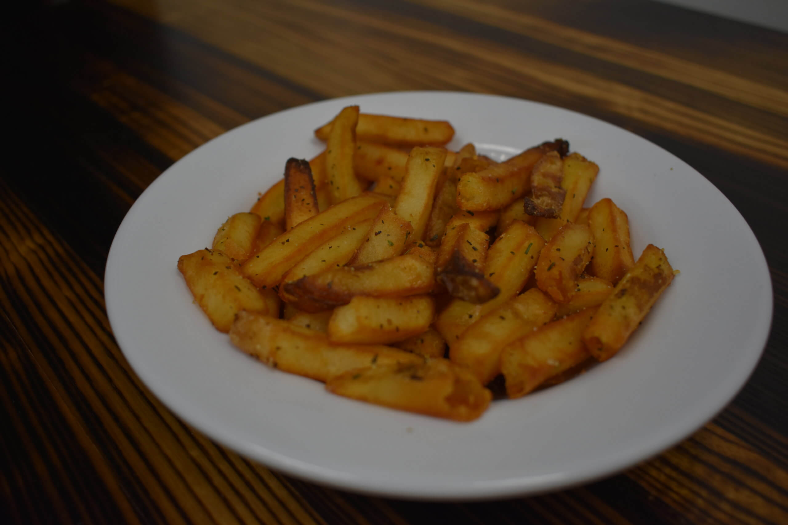 Order of french fries from Pequod's Pizza in Chicago.