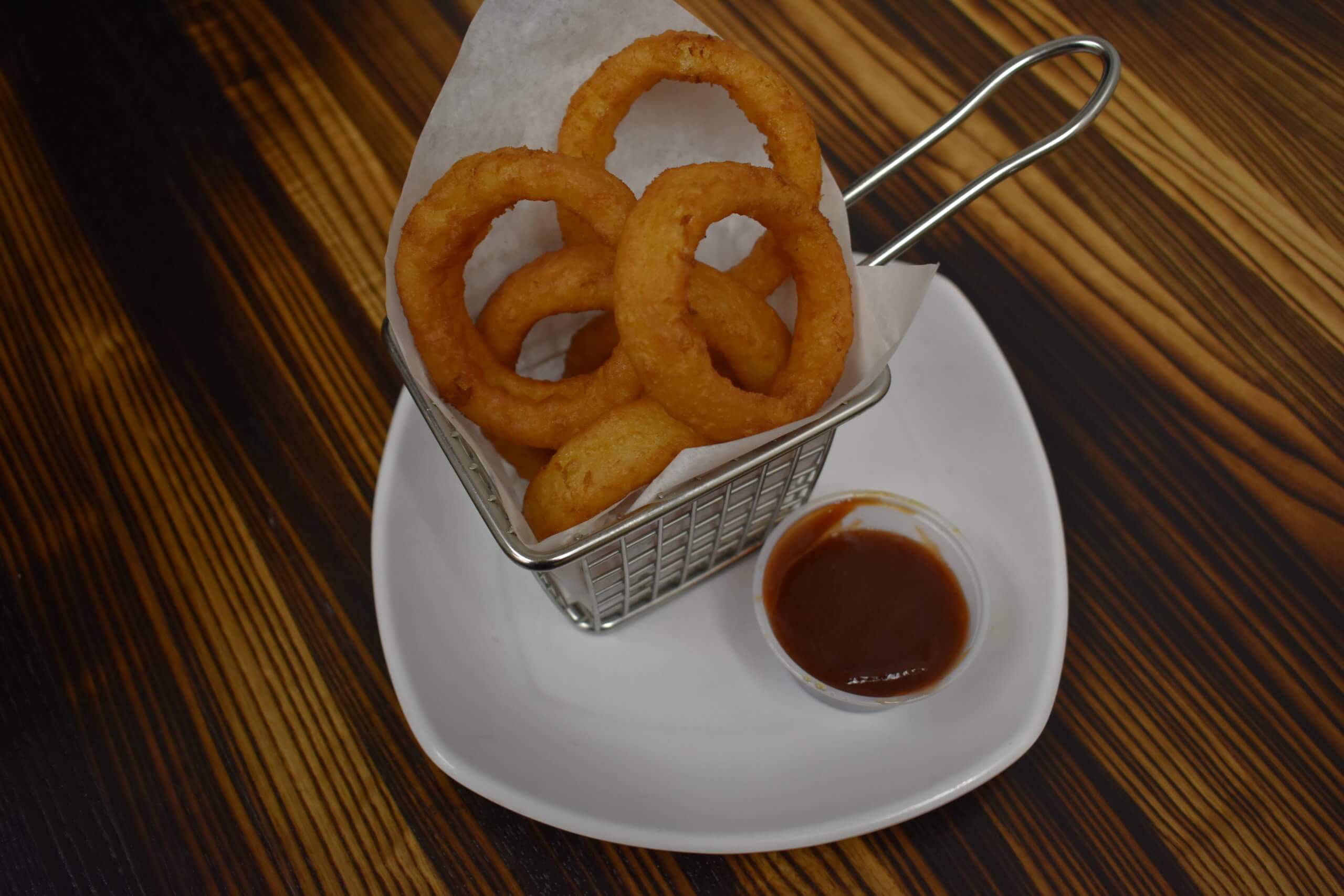 Onion rings appetizer at Pequod's Pizza.